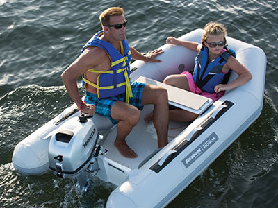 A boat speeding across the water 